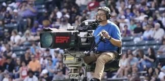 live sports, broadcast television, streaming era, sports programming, NBC Sports, FOX Sports, CBS Sports, ESPN, ABC, NFL, NBA, MLB, college football, college basketball, Premier League, PGA Tour, Olympics, NASCAR, UEFA Champions League, WNBA, NWSL, CW Network, ION Network, media strategy, ratings boost, appointment viewing, sports rights, network television, communal viewing, sports media
