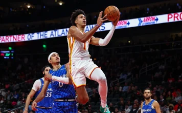 Hawks roll to 127-112 victory over the Magic